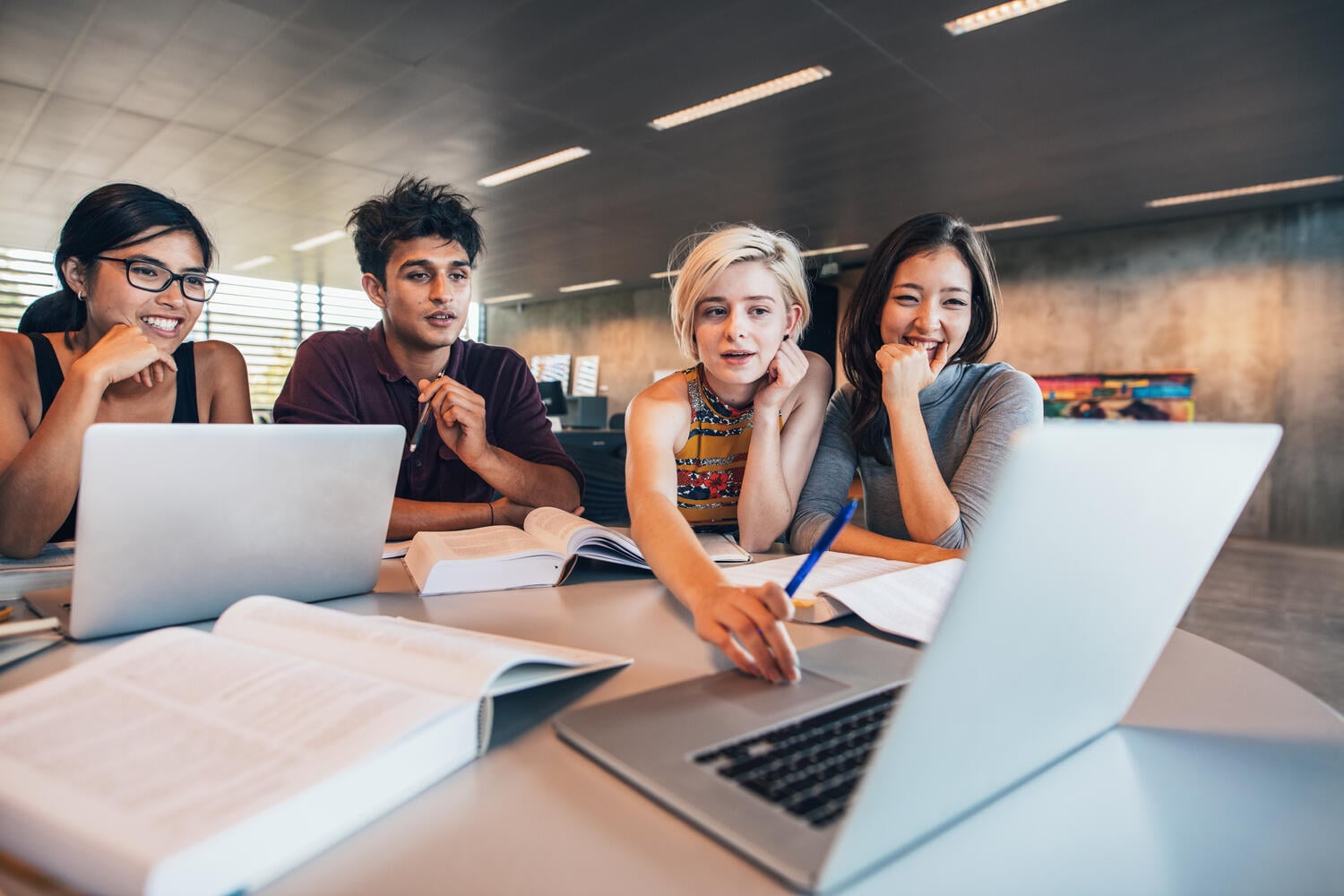 college-students-using-laptop